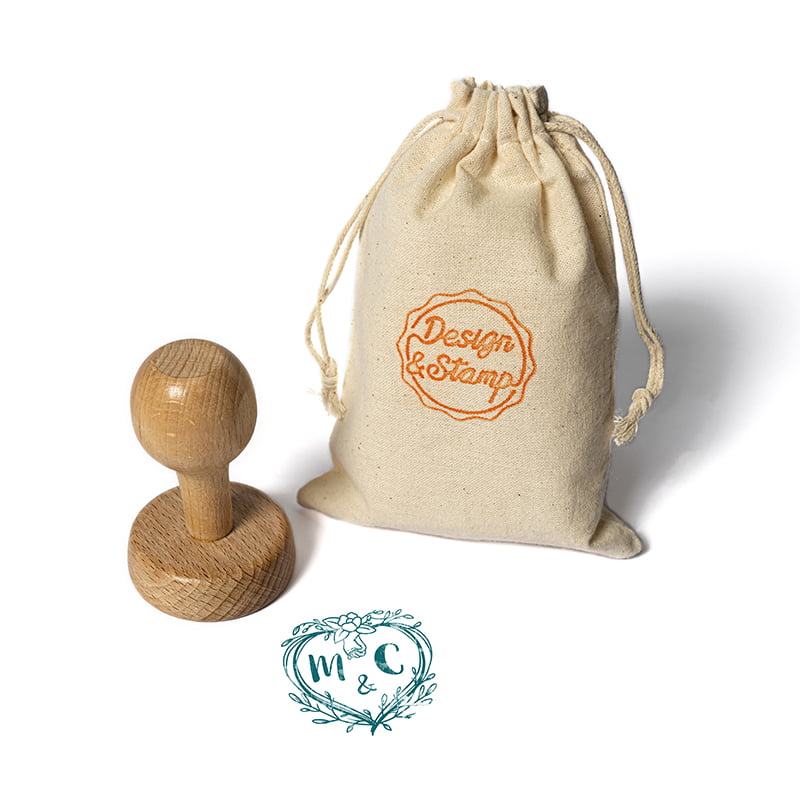 Eventos 1 - Sello manual redondo Ø 45 mm con montura de madera y bolsita porta sello.